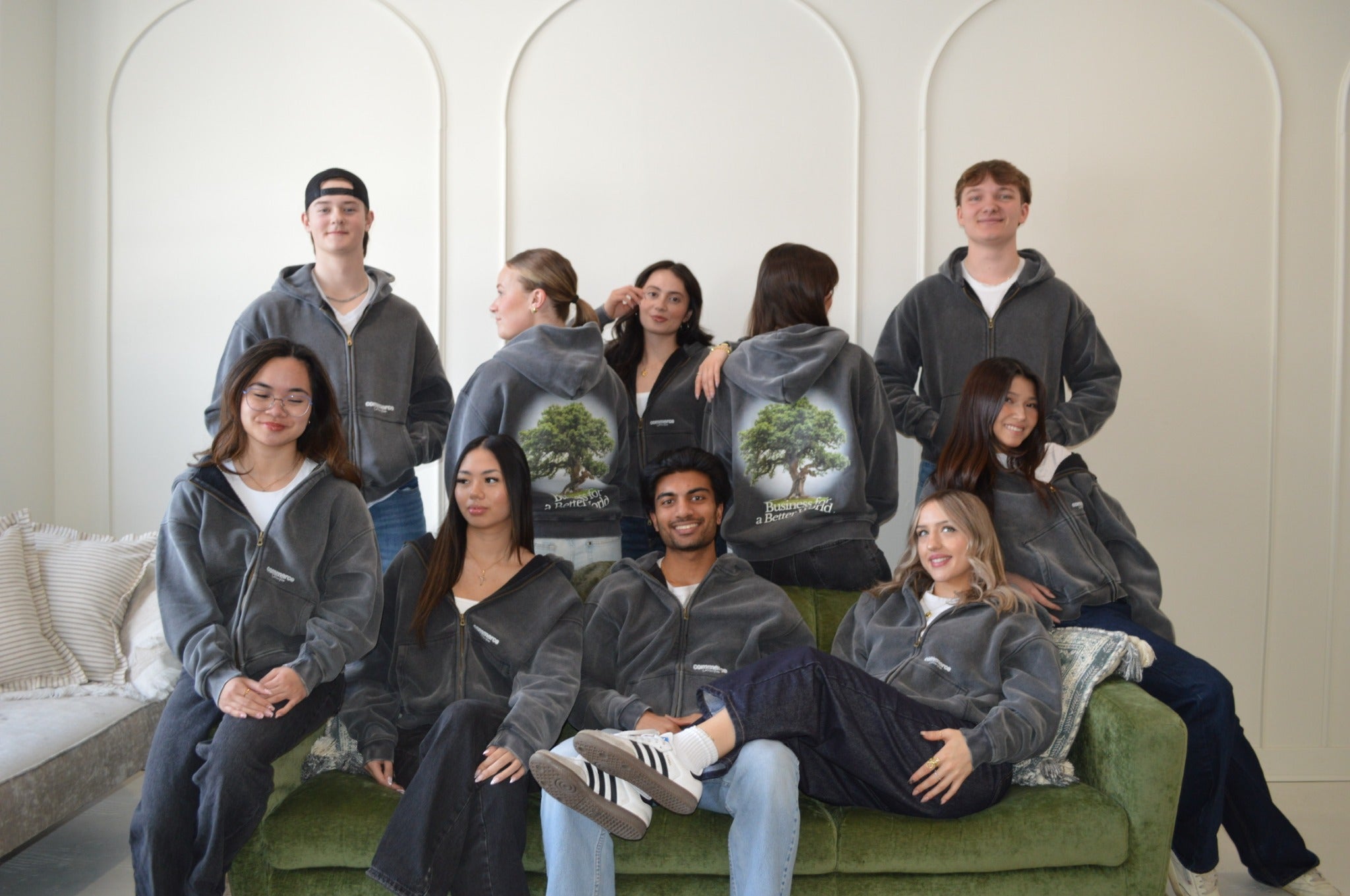 Students in Commerce Collective hoodies