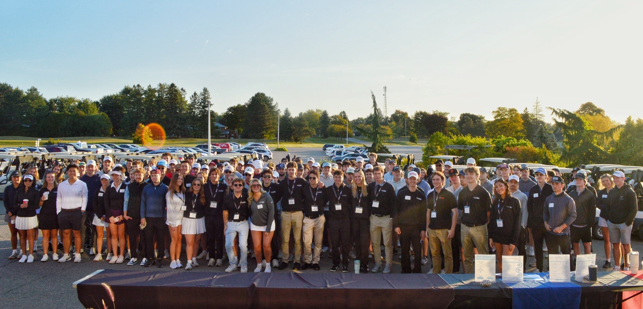 Students and participants at the LANG Golf Tournament