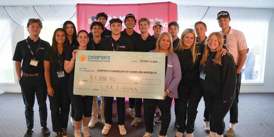 LSA and GSMA students presenting a fundraising cheque to the Children's Foundation of Guelph and Wellington
